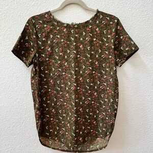 Olive floral shell with button close on back